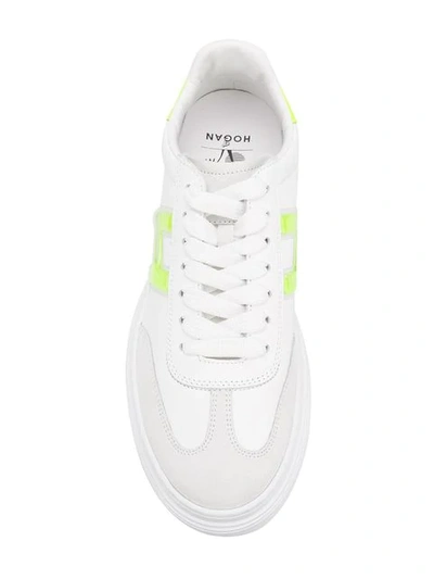 Shop Hogan Low Top Sneakers In White