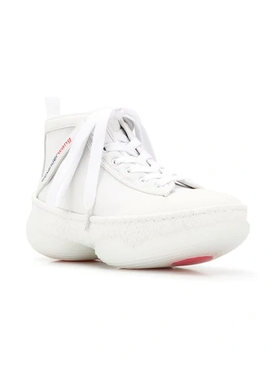 Shop Alexander Wang Lace Up Hi-top Sneakers In White