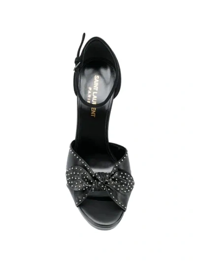 Shop Saint Laurent Studded Bow Leather Sandals In Black