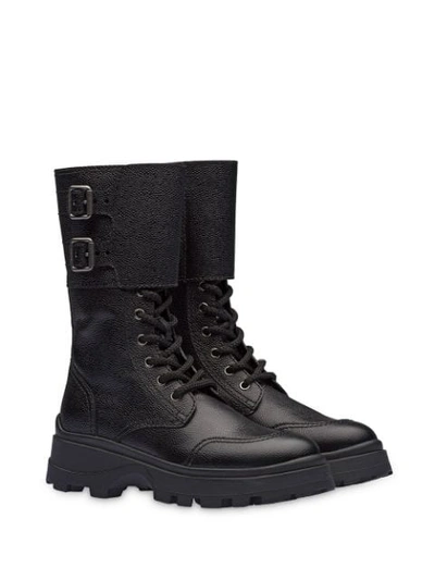 Shop Miu Miu Side Buckle Chunky Boots In Black