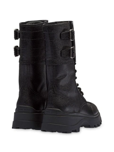 Shop Miu Miu Side Buckle Chunky Boots In Black