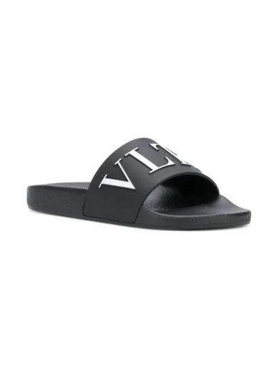 Shop Valentino Garavani Vltn Print Slides In Black