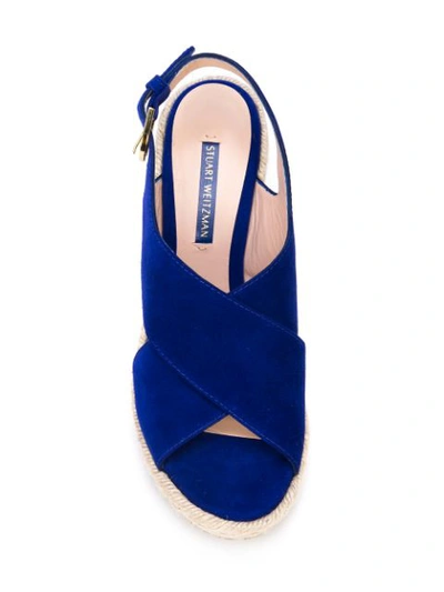 Shop Stuart Weitzman Cross Strap Sandals In Blue