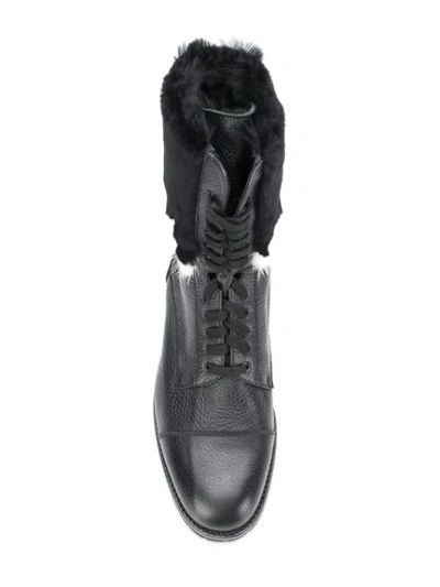 Shop Manolo Blahnik Campcha Fur Military Boots - Black