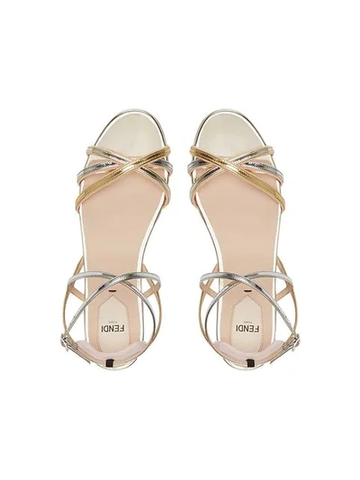 Shop Fendi Strappy Flat Sandals In Gold