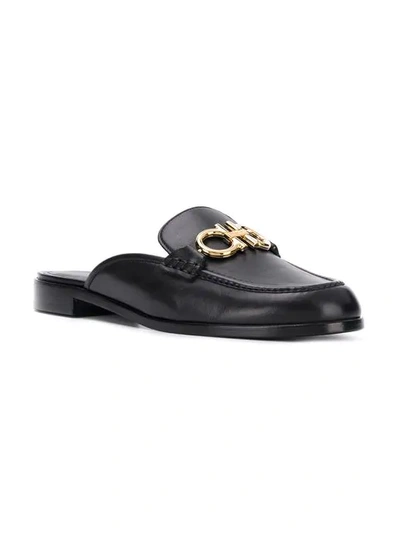 Shop Ferragamo Gancini Mule Slippers In Nero Chiaro