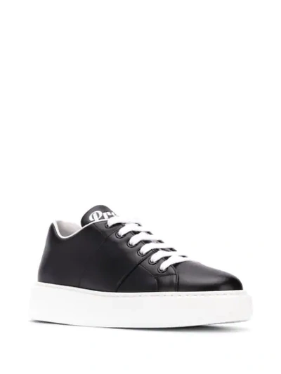 Shop Prada Low Lace-up Sneakers In Black