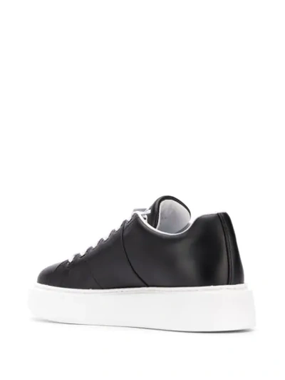 Shop Prada Low Lace-up Sneakers In Black