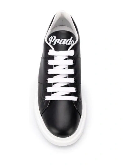 Shop Prada Low Lace-up Sneakers In Black