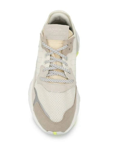 Shop Adidas Originals Nite Jogger Sneakers In Owhite Ftwwht Hireye