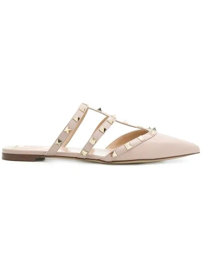 Shop Valentino Garavani T.05 Rockstud Mules In Neutrals