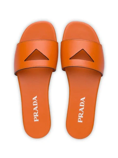 Shop Prada Cut-out Flat Slides In Orange