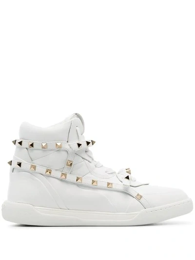 Shop Valentino Rockstud Hi-top Sneakers In White