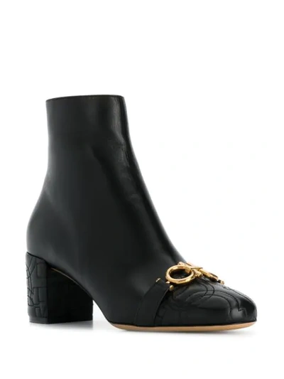 Shop Ferragamo Gancini Ankle Boots In Black