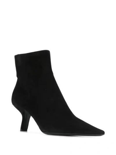 Shop Prada Slanted Heel Ankle Boots In Black