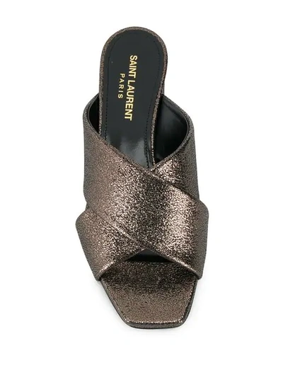 Shop Saint Laurent Cross Over Mules In Brown