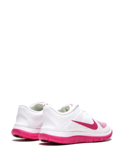 Shop Nike Womens Free 4.0 V4 Sneakers In White