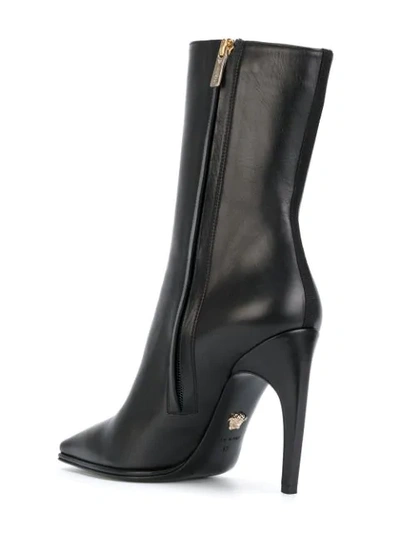 Shop Versace Heeled Ankle Boots In Black