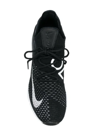 Shop Nike Air Max 270 Flyknit Sneakers In Black