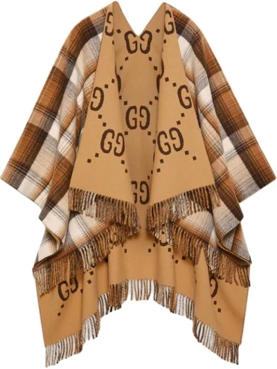 Shop Gucci Reversible Gg Wool Poncho In Brown