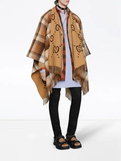 Shop Gucci Reversible Gg Wool Poncho In Brown