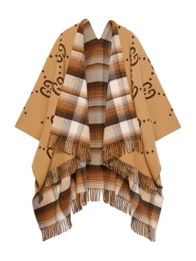 Shop Gucci Reversible Gg Wool Poncho In Brown