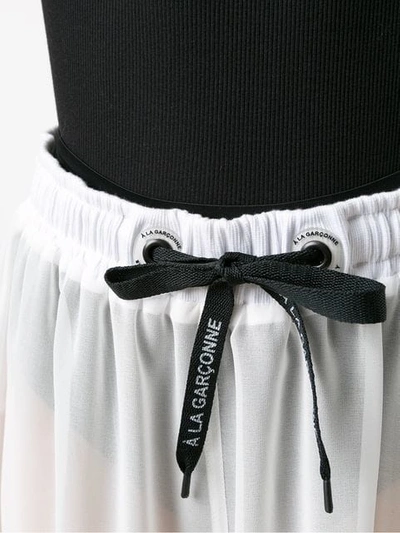 Shop À La Garçonne Chiffon Bermuda Shorts In White