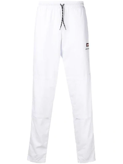 Shop Andrea Crews Logo Track Pants - White