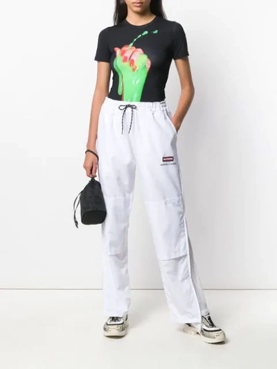 Shop Andrea Crews Logo Track Pants - White