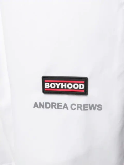 Shop Andrea Crews Logo Track Pants - White