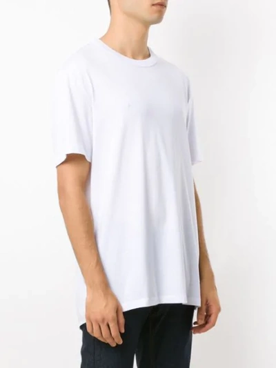Shop À La Garçonne + Hering Buttoned T-shirt In White
