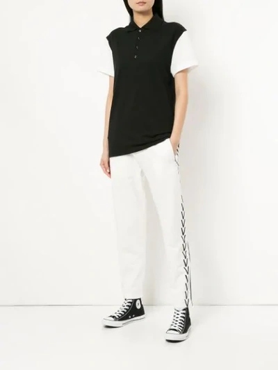 Shop Ports V Contrast Sleeve Polo Shirt In Black