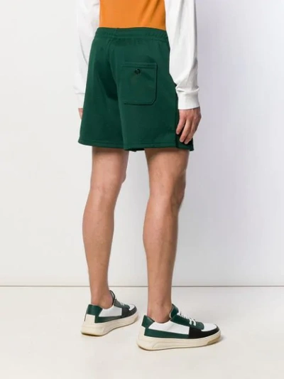 Shop Acne Studios Face Patch Track Shorts In Green