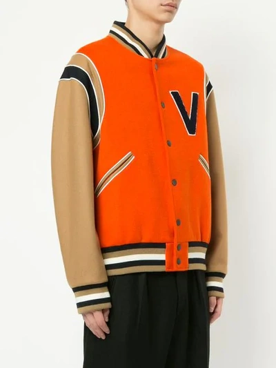 Shop Ports V Varsity Jacket In Orange