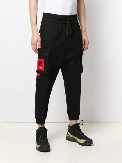 Shop Ktz Tapered Jogging Trousers In Black