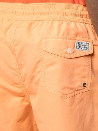 Shop Polo Ralph Lauren English Bear Swimming Trunks In Orange