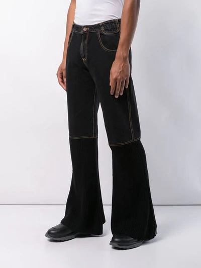 Shop Telfar Boot Cut Wide Leg Jeans In Black