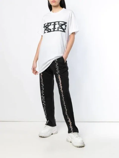 Shop Ktz Pin Embroidery Track Pants In Black
