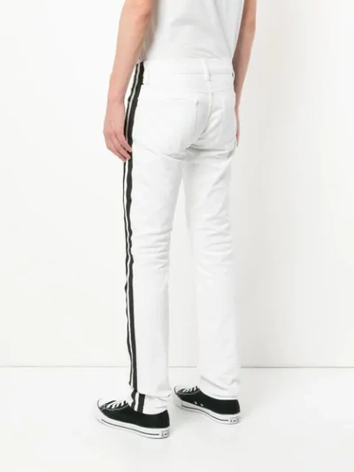 Shop Ports V Contrasting Side Panel Skinny Jeans In White