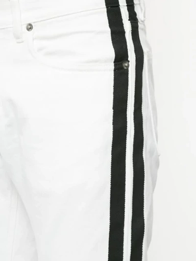Shop Ports V Contrasting Side Panel Skinny Jeans In White