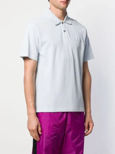 Shop Acne Studios Face Motif Polo Shirt - Blue
