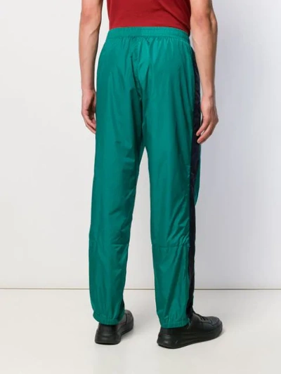 Shop Acne Studios Contrasting Stripe Track Trousers In Bcd-bright Green