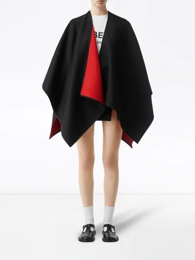 Shop Burberry Logo Detail Wool Jacquard Cape In Black