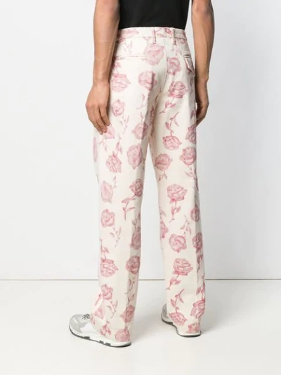 Shop Aries Rose Print Trousers In Neutrals
