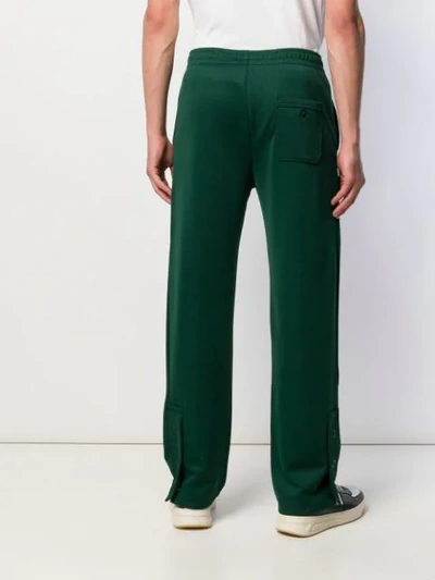 Shop Acne Studios Face Patch Track Trousers In Green