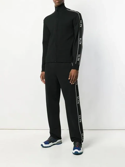 Shop Valentino Vltn Track Pants In Black