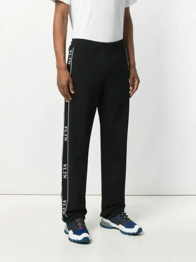 Shop Valentino Vltn Track Pants In Black