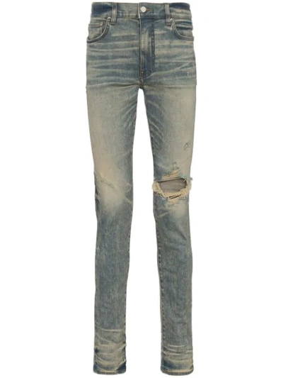 Shop Amiri Distressed Skinny Jeans In Blue