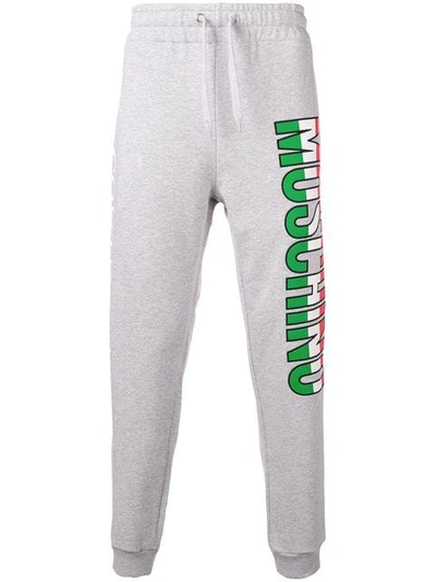 Shop Moschino Logo Print Track Pants In Grey