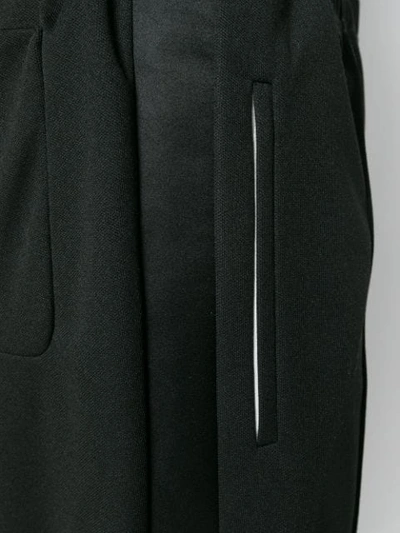 Shop Maison Margiela Side-stripe Fitted Trousers In Black